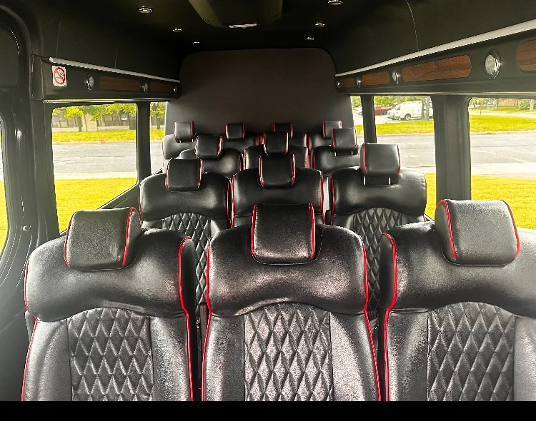 High-back leather seating inside an ALR shuttle vehicle.